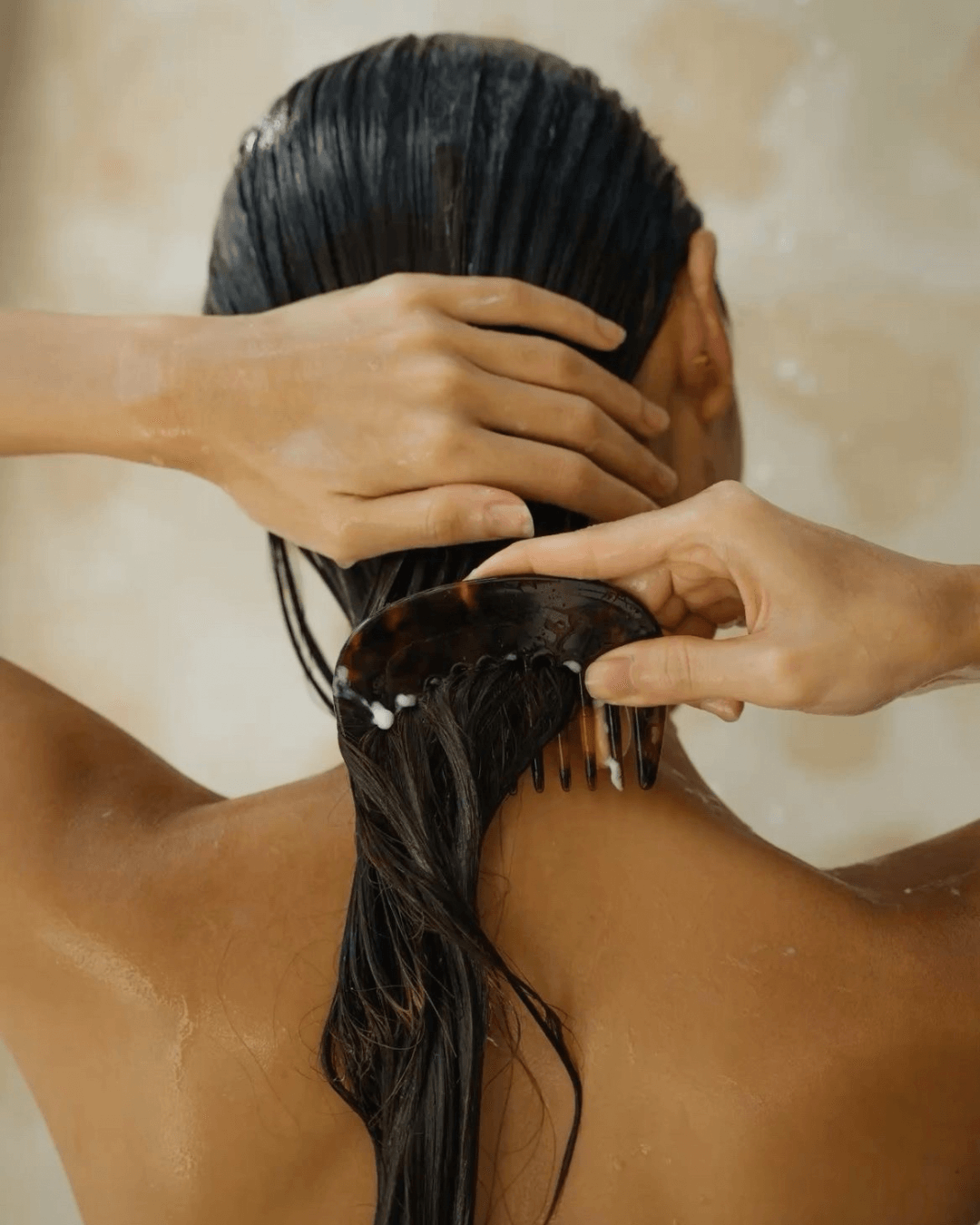 Woman using Ngilla Flow filter in shower — skincare-friendly filter for dry or sensitive skin