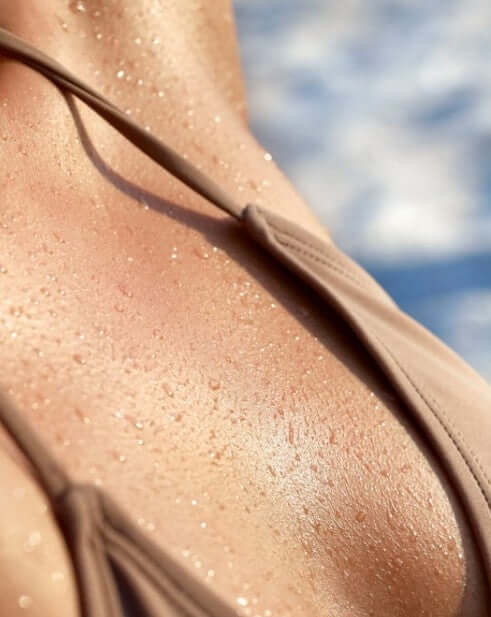 smooth chest and shoulders after shower exfoliation with mitt